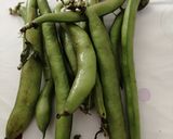 A picture of step 1 of Salted broad beans with iberico ham #SeasonSupply.