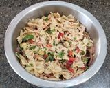 A picture of step 5 of Roasted Red Pepper, Artichoke and Olive Pasta Salad.