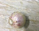 A picture of step 1 of Aloo ka bhurta.