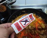 Foto del paso 4 de la receta: Paella con costillas de cerdo y gambas