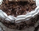 A picture of step 19 of Two tier vanilla and chocolate cake 🎂.
