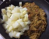 A picture of step 7 of Masala rice with aloo gravy.