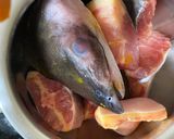 A picture of step 1 of Fish in raw mango curry.