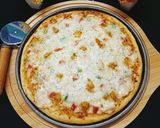 A picture of step 4 of Chicken Pizza 🍕🍕.