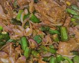 A picture of step 8 of Bhindi Gosht (okra).