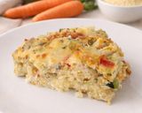 Foto del paso 7 de la receta Pastel de verduras y pollo al horno con base de polenta