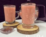 A picture of step 4 of Roohafza Chai/Rose Tea.