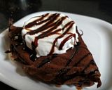 A picture of step 3 of Non fermented chocolate Dosa with ice cream and chocolate sauce.