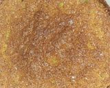 A picture of step 6 of Maize Malva Pudding drizzled with custard.