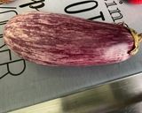 Une image de l'étape 1 de Aubergine et poivron aux tomates confites, coriandre et épices.