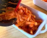 A picture of step 7 of Sausage pasta bake in tomato cream sauce.