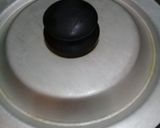 A picture of step 6 of AlooBaingain karhai.