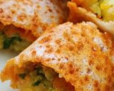 A picture of step 4 of Schezwan masala dosa rolls.