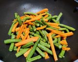 A picture of step 1 of Schewan beans and carrot stir fry.