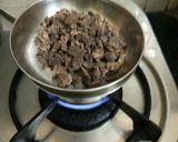 A picture of step 1 of Chocolate coconut chikki.
