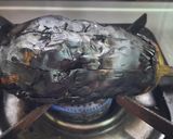 A picture of step 2 of Baingan ka bharta.