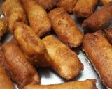 A picture of step 5 of Schezwan paneer bread rolls.