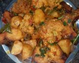A picture of step 29 of Aloo fulcopi katla rosha ar misti doi.