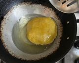 A picture of step 2 of Khaati Meethi Aam Ki Poori.