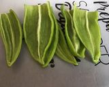 Une image de l'étape 1 de Saucisses aux poivrons verts et épices créoles.