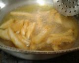 A picture of step 6 of Chilie garlic french fries.