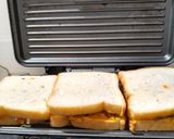 A picture of step 5 of Easy peasy cheesy sandwich.