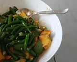 A picture of step 2 of Raw Mango carrot green chili garlic pickle.