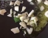 A picture of step 1 of Bajra Cheesy Modaks.