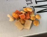 Une image de l'étape 2 de Piments jaunes au vinaigre, ail, pickles, olives et citron.