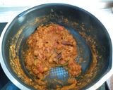 A picture of step 14 of Cabbage curry with green peas nd potato.