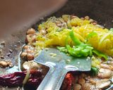 A picture of step 2 of Green raw mango rice.