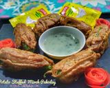 A picture of step 7 of Potato Stuffed Chilli Pakoray.