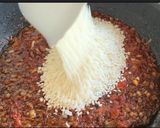 Foto del paso 5 de la receta: Arroz con muslitos de pollo, champiñones y pimientos