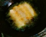 A picture of step 7 of Chinese rolls.