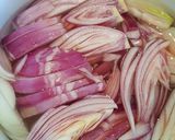 A picture of step 3 of Chicken Escabeche.