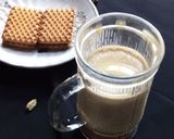 A picture of step 3 of Tulsi masala tea.