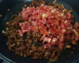 A picture of step 5 of Baingan Ka Bharta (Smoky flavor egg plant bharta).