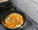A picture of step 5 of Afgani Pulao.