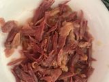 Lasaña de alitas de pato y habitas baby