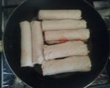 Une image de l'étape 3 de Roulé de pain de mie au saucisse.