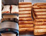 A picture of step 3 of Cheese and Tomato Grilled Sandwich with French Fries.