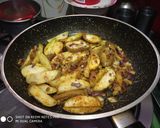 A picture of step 2 of Stuff Brinjal with potato wedges.
