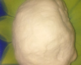 A picture of step 6 of Bomboloni.
