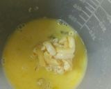A picture of step 9 of Fried Mac and Cheese Balls.