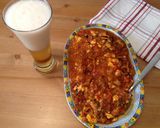 A picture of step 5 of Seafood Saganaki.