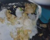 A picture of step 2 of Alferedo chicken bread.