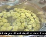 A picture of step 8 of Ricotta gnocchi with porcini and broccoli.
