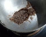 A picture of step 6 of Walnut phirni in chocolate square.