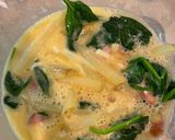 A picture of step 4 of Spanish omelet with spinach and cheese.