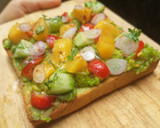 A picture of step 3 of Mango Guacamole Toast.